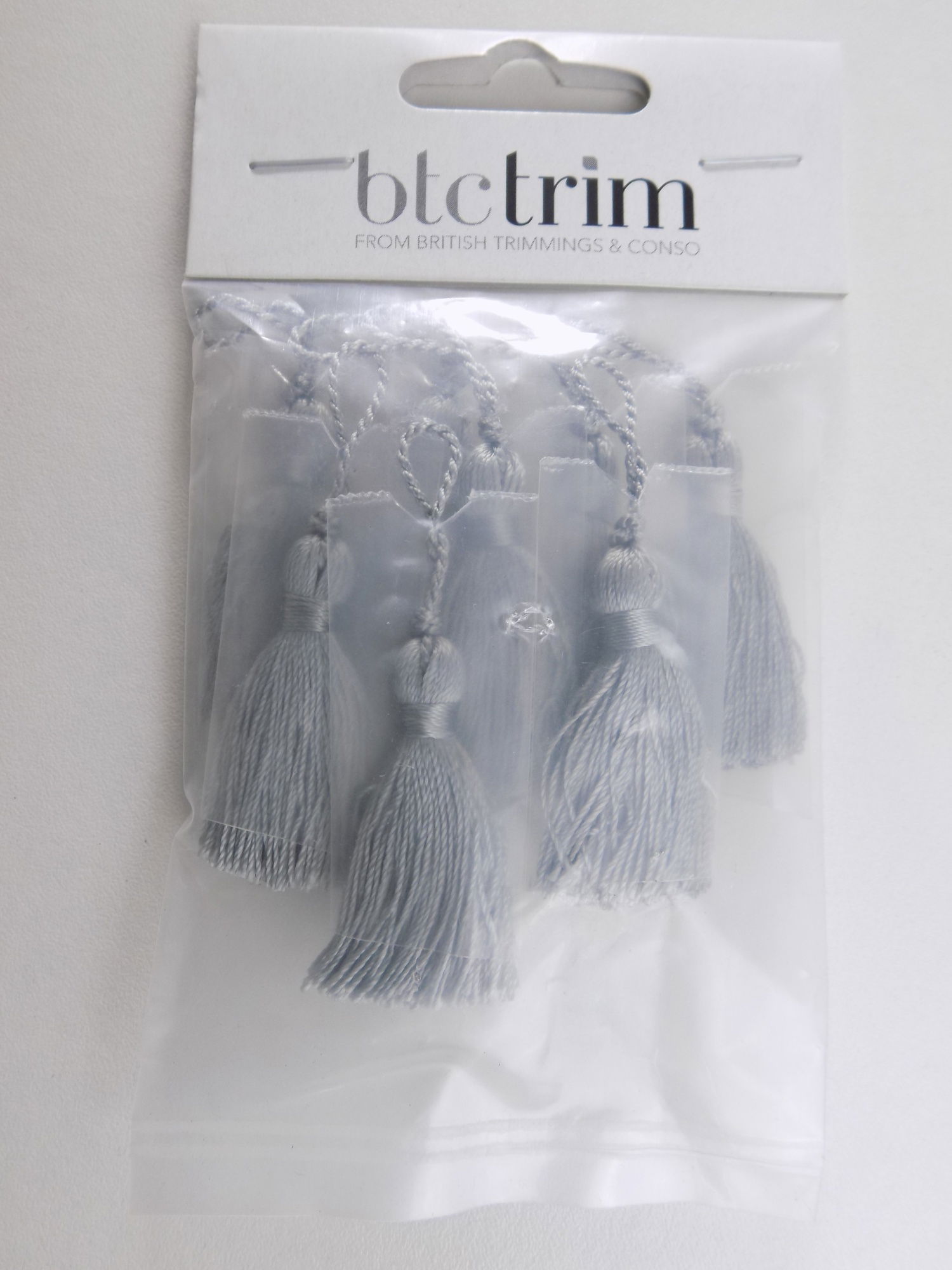 BTTA12  SILVER 4CM TASSEL PACK OF 8